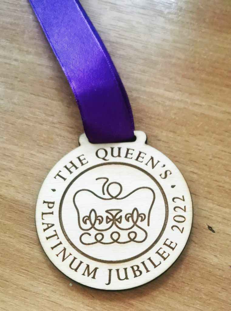 Engraved wooden jubilee medal